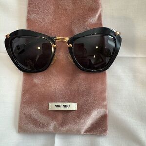 Miu Miu Black Cat-Eye Sunglasses with Gold Accents